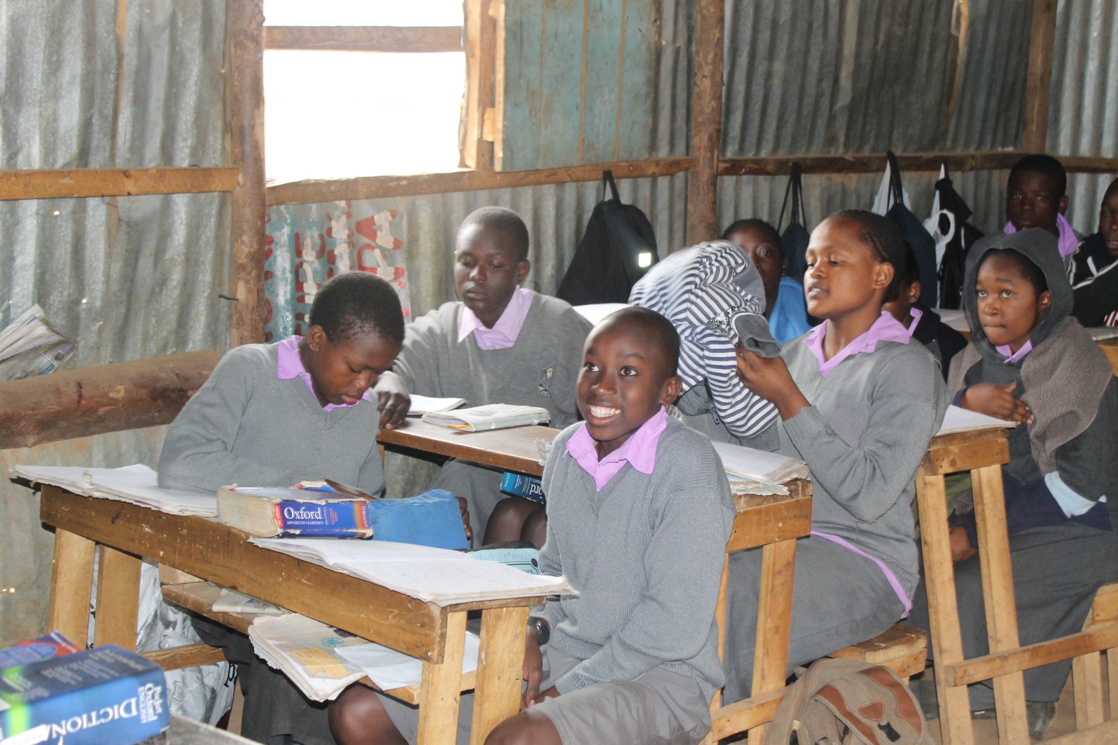 Students learning together at their desks.